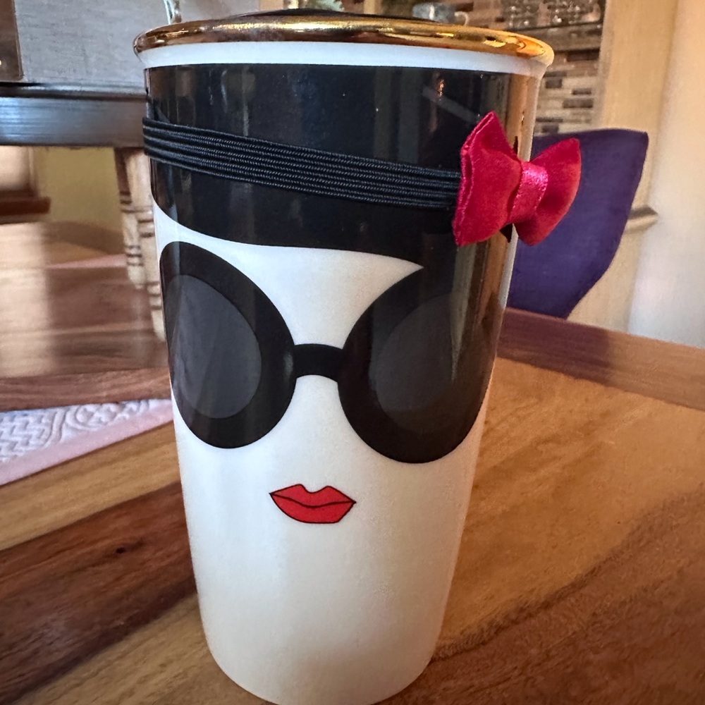 Starbucks Alice Olivia Stace Face with now headband.